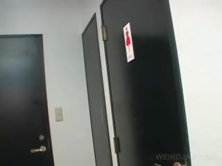 Asian Teen enchantress clips Twat While Pissing In A Toilet